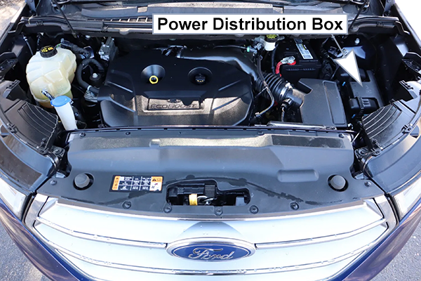 Ford Edge (CD539; 2015-2018): Engine compartment fuse box location